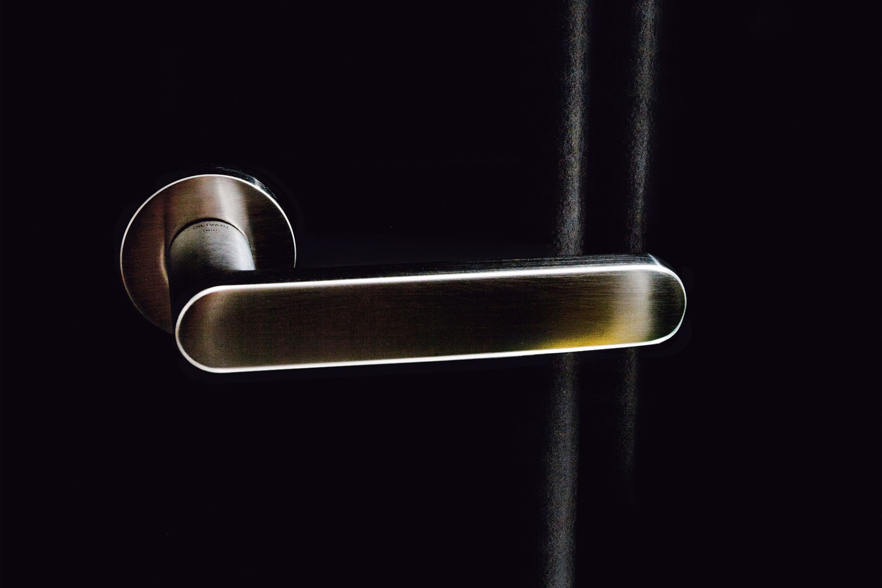 Set de manijas OLIVARI, modelo LINK, diseño de Piero Lissoni 2006