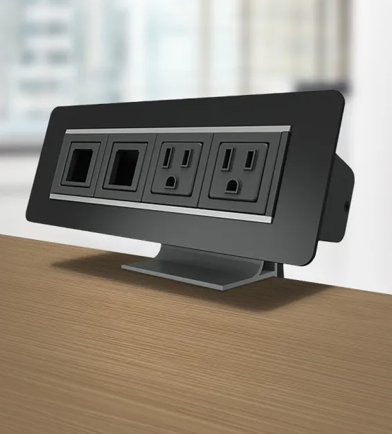 Multicontacto AXIL X para montaje sobre superficie, con 2 conexiones eléctricas y 2 puertos opcionales, acabado negro. Hasta agotar existencias.