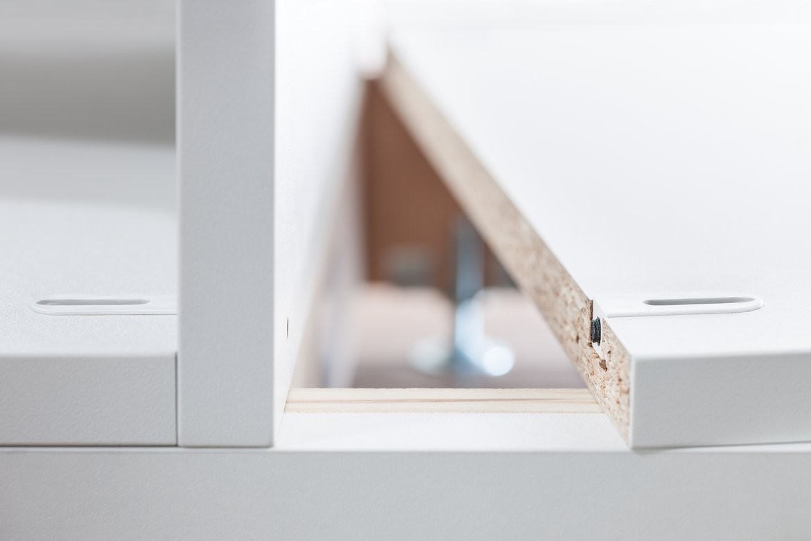 Sistema oculto CABINEO para armado de muebles