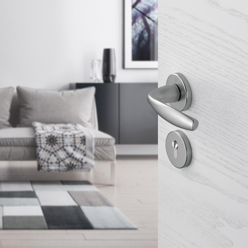 Set de manija NEW YORK y cerradura POLARIS para puerta de recámara, acabado inox mate