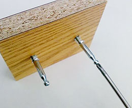 Sistema de taquete y perno oculto QUICK DOWEL para unión de paneles